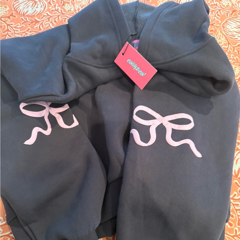 Edikted bow dark Gray Sweatshirt with Pink Tag.  NWT, never worn. Size XL.